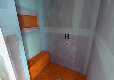 Construction d'une douche avec plancher chauffant